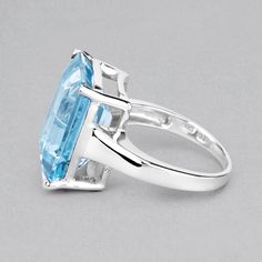 "Sky Blue Topaz Ring, Solitaire Blue Topaz Octagon Silver Ring, Natural Blue Topaz Ring for Women, December Birthstone Ring Flaunt yourself with this blue topaz solitaire ring. The natural gemstones have a combined weight of 15.53 carats and are set in .925 sterling silver with rhodium plating. The soft blue hue of this ring adds a pop of color to any look! The understated design and vibrant stones make this ring perfect for every occasion. .925 Sterling Silver Stone Details: Blue Topaz Item Typ Fine Jewelry Blue Amethyst Promise Ring, Blue Amethyst Gemstone Ring For Promise, Blue Amethyst Promise Ring, Blue Topaz Rings With Gemstone Accents For Promise, Blue Amethyst Promise Ring In Fine Jewelry Style, Blue Amethyst Gemstone Promise Ring, Blue Amethyst Ring With Accent Stones, Blue Topaz Open Ring, Fine Jewelry Blue Topaz Crystal Ring