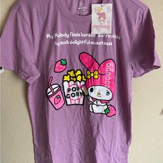 New & Never Used Medium My Melody Shirt Cute Purple Tops With Relaxed Fit, Cute Purple Relaxed Fit T-shirt, Cute Purple Short Sleeve Shirt, Cute Purple Shirt With Graphic Print, Trendy Purple Shirt With Graphic Print, Cute Purple Spring T-shirt, Cute Purple Top With Graphic Print, Cute Lavender Cotton Top, Trendy Purple Shirt With Letter Print