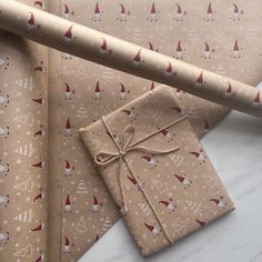 wrapping paper wrapped in twine and tied with string