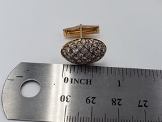 Title: Set of Oval Gold Cufflink with Pave Diamonds 14KT Yellow Gold Designer: NONE MaterialYellow Gold 14kt Stamped Style: Vintage All measurements are approximate and may vary slightly from the listed dimensions. 82 Diamonds of 2.4 mm approx. each Round 4.10 CT approx. Color : G-H Clarity: VS Estimated Measurements19.36mm x 14.60mm x 5.38mm Estimated Total Weight of the Item : DWT: 7.5 Grams: 11.6 ConditionPre-owned- In Very Good Condition -light Scratches. Dealer number EE0000130-CL PLEASE LO Classic Oval Yellow Gold Cufflinks, Classic Yellow Gold Oval Cufflinks, Oval Yellow Gold Jewelry For Business, Classic Gold Oval Cufflinks, Classic Diamond Cufflinks For Wedding, Oval Gold Jewelry For Business, Diamond Cufflinks With Polished Finish For Formal Events, Formal Diamond Cufflinks With Polished Finish, Oval Yellow Gold Cufflinks For Gift