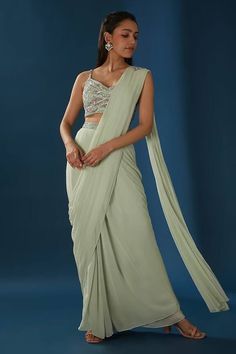 Mint pre-draped saree with sequin, stone, cutdana and pearl. Paired with coordinating embroidered sleeveless padded bustier. - Aza Fashions Draped Saree, Drape Saree, Aza Fashion, Types Of Sleeves, Custom Made, Sequin, Saree, Mint, V Neck