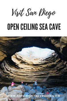 the entrance to an open ceiling sea cave with text overlay that reads visit san diego