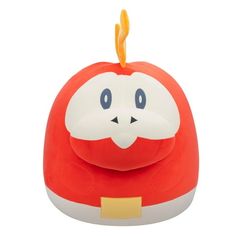 an orange and white toy with blue eyes on it's face, sitting in front of a white background