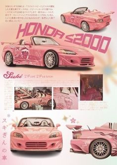 the pink sports car is parked in front of an advertisement for honda's 2000