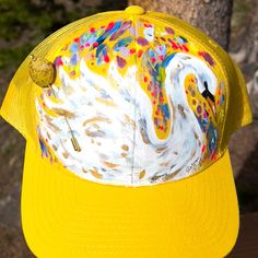 Yellow Trucker Hat with Hand Painted "Swan" and Vintage Bead Hat Pin Yellow Handmade Cap, Yellow Mini Hats One Size Fits Most, Handmade Yellow Cap, Yellow Trucker Hat With Curved Brim For Spring, Whimsical Yellow Handmade Hat, Yellow Adjustable Trucker Hat For Spring, Whimsical Handmade Yellow Hat, Handmade Yellow Whimsical Hat, Adjustable Yellow Trucker Hat For Spring