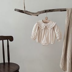 Introduce your little one to timeless elegance with this soft, breathable cotton-linen romper. The long sleeves and minimalist design make it ideal for year-round wear. Featuring a delicate natural texture, this romper combines simplicity with style for any occasion. Snap closures at the crotch ensure easy diaper changes. Features: Made from a premium blend of cotton and linen Snap closures for convenience Long sleeves for year-round versatility Natural, soft fabric perfect for sensitive skin Cream Long Sleeve Cotton Jumpsuit, Long Sleeve Cotton Bubble Romper, Cream Long Sleeve Bubble Romper For Summer, Summer Cream Long Sleeve Jumpsuits And Rompers, Cream Long Sleeve Jumpsuits And Rompers For Summer, Cream Long Sleeve Jumpsuits For Summer, Cream Long Sleeve Jumpsuits And Rompers For Spring, Cream Long Sleeve Jumpsuits For Spring, Bamboo Shop