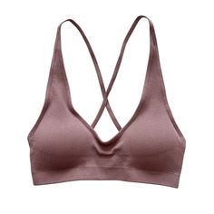 Experience style and comfort in one package with the Mauve Seamless Ribbed Cross Back Bralette. This chic bralette, perfect for both loungewear and sports purposes, promises unrivaled comfort and flexibility. Made with soft, ribbed fabric that hugs your curves, it showcases a stylish cross-back design that guarantees support and a free range of motion. Whether you're studying, working out, or just lounging around, this bralette can keep up with your busy schedule. It's naturally breathable, ensu Trendy Solid Sports Bra For Loungewear, Trendy Solid Color Sports Bra For Loungewear, Loungewear Bra With Seamless Construction, Seamless Solid Color Bra For Loungewear, Trendy Seamless Workout Bra, Seamless Solid Sports Bra For Loungewear, Seamless Sports Bra For Relaxation, Trendy Seamless Sports Bra For Loungewear, Solid Color Seamless Sports Bra For Loungewear