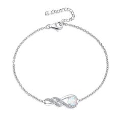 PRICES MAY VARY. ❤925 STERLING SILVER WITH WHITE GOLD PLATED❤ The pendant and chain are made of 925 sterling silver with real white gold plated surface. Hypoallergenic, lead and nickel free. The safe materials and oxidation resistance ensure your health and fashion. ❤BIRTHSTONE BRACELET FOR WOMEN❤ This infinity bracelet is set with synthetic opal and simulated diamonds, with a precision brilliant cut that allows the gems to shine. Opal in October represents luck and hope. This gem bracelet full Month Birthstones, Silver Pearl Bracelet, Beautiful Meaning, Infinity Pendant, Gems Bracelet, Garnet Bracelet, Birthstone Bracelet, Synthetic Opal, Birthstone Bracelets