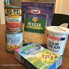 three containers of frozen food on a table