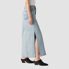 Our Long Icon Skirt is the timeless, maxi denim skirt you’ve been searching for, with a mid rise and the iconic Levi’s® details you know and love . Flip it over and you’ll find two back pockets that were designed to flatter just like the ones on your favorite 501® jeans. In 1873, Levi's ® invented the blue jean. What started as a piece of clothing for the American worker quickly became an icon of American style around the globe. And every Levi's ® style is crafted with the same high standard of Chic Fitted Medium Wash Maxi Skirt, Levi's Denim Skirt For Spring, Spring Levi's Denim Skirt, Modern Bottoms With Frayed Hem For Spring, Chic Full-length Denim Skirt For Spring, Spring Chic Full-length Denim Skirt, Levi's Full-length Medium Wash Bottoms, Levi's Medium Wash Full Length Bottoms, Chic Dark Wash Full-length Denim Skirt