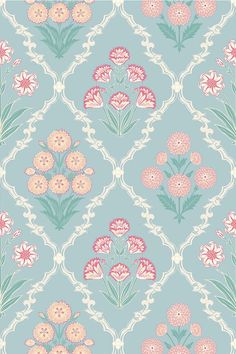 a blue and pink wallpaper with flowers in the middle, on top of it