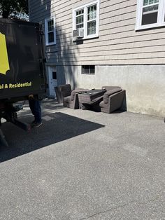 a man standing in front of a moving truck