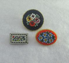 "This listing is for your choice of ONE item. When checking out, please pick which one you want ! Pick your favorite ! Elegant micro mosaic brooches with beautiful details. Some signs of wear and tarnish. Please ask for additional pictures. Accordingly to https://www.collectorsweekly.com/fine-jewelry/micro-mosaic: The term \"micro mosaic\" (also spelled \"micromosaic\" and \"micro-mosaic\") was coined by wealthy 20th-century collector Sir Arthur Gilbert in reference to Roman mosaics composed of Micro-elastic Swimwear For Swimming, Antique Multicolor Brooch For Gifts, Micro Mosaic Jewelry Tutorial, Antique Multicolor Brooch Jewelry, Roman Mosaics, Italian Micro Mosaic Jewelry, Leaf Scarf, Roman Mosaic, Micro Mosaic