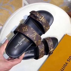 Size: Standard Size It comes with Dust box, Care manual, Tag, and Paper bag.Size Guide: Luxury Slides With Buckle Closure, Luxury Brown Slides, Designer Brown Flat Slides, Luxury Brown Slides With Round Toe, Designer Leather Slides In Brown, Designer Brown Leather Slides, Zapatillas Louis Vuitton, Mules Sandals, Street Style Shoes