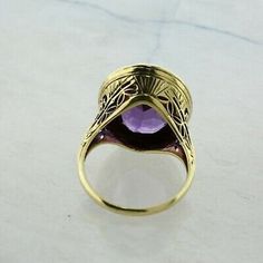 Vintage 14K Yellow Gold 5 ct Amethyst Ring, 11x14mm rich purple amethyst gold bezel halo tooled, .75 inch across, Ring size 6, Circa 1950, 5.5 grams Stock # BB259R16 This listing contains photographs of the actual item you will receive. Our items are in excellent condition with little or no signs of wear and many are one of a kind pre-owned estate finds. Please look closely at the pictures in this listing as they are part of the product description. Please read the description, as any imperfecti Sparkly Ring, Gold Diamond Band, Amethyst Gold, Rich Purple, Amethyst Gem, Purple Band, Fine Jewelry Designers, Boston Ma, Blue Topaz Ring