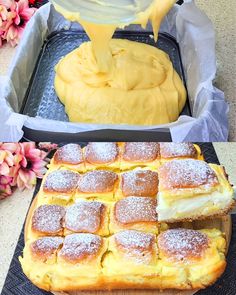 a pan filled with cake next to another pan covered in powdered sugar