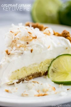 a slice of key lime pie on a white plate