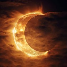 the sun eclipse during a solar eclipse with clouds in the foreground and dark sky