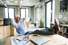 an old man relaxing in his office