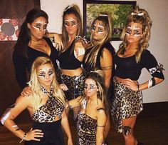 the girls are all dressed up in animal print outfits and have their faces painted like leopards