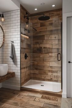 a bathroom with wood paneling and white tile on the walls, along with a walk in shower