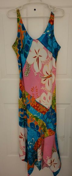 Vintage 1990’s Jams World Floral Hawaiian Long Dress, Multicolored SZ M beautiful condition measures  18 " from armpit to armpit  44 " length check out my listing for other designer items Retro Multicolor Print Dress For Vacation, Multicolor Sleeveless Hawaiian Dress, Retro Multicolor Maxi Dress With Vibrant Print, Retro Multicolor Printed Maxi Dress, Vintage Multicolor Maxi Dress For Vacation, Fitted Multicolor Hawaiian Dress, Multicolor Vintage Maxi Dress For Vacation, Fitted Multicolor Tropical Maxi Dress, Hawaiian Multicolor Spring Dress