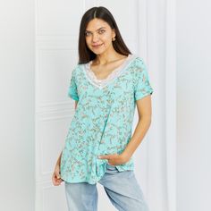 This Floral Top Is A Spring/Summer Must-Have! The Beautiful Lace V-Neck Detail Is A Great Touch To The Bright Floral Pattern, Making It Very Feminine And Soft. The Styling Options Are Endless Because Of The Simple Loose T-Shirt Look. Pattern Type: Floral Style: Casual Features: Lace Neckline: V-Neck Length: Long Sleeve Length: Short Sleeves Sleeve Type: Raglan Sleeves Sheer: No Material Composition: 92% Polyester, 8% Spandex Stretch: Highly Stretchy Care Instructions: Machine Wash Cold. Tumble D Casual Floral Print V-neck Top For Summer, Light Blue V-neck Top For Vacation, Light Blue Floral Print V-neck Top, Casual Summer V-neck Top With Floral Print, Blue Tops With Lace Trim For Vacation, Summer Lace Trim Loungewear Top, Summer Lace Trim Top For Loungewear, Summer Blue Tops With Lace Trim, Summer Light Blue Tops With Lace Trim