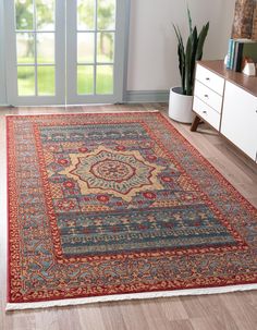 Made in Turkey, this  Mamluk Collection rug is Machine woven of  Polypropylene. This rug is easy-to-clean, stain resistant, and does not shed. This rug has fringe. Colors found in this rug include: Navy Blue, Red, Light Blue, Light Brown, Light Green. The primary color is Navy Blue. This rug is 1/2" thick. Features: Fringe, Medallion, Traditional, Transitional Aqua Rug, Mamluk Rugs, Navy Blue Rug, Rugs Uk, Turkey Design, Target Rug, Large Dining Room, Bed In Living Room, Navy Rug