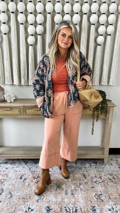 Dark blue jacket with peach design on the outside and peach striping on the inside. Oversized fit, paired with peach lounge pants and papaya tank top. Car Shopping Outfit, Relaxed Fit Outerwear With Pockets For Day Out, Bohemian Fall Loungewear Outerwear, Bohemian Fall Outerwear For Loungewear, Bohemian Loungewear Outerwear For Fall, Comfortable Oversized Spring Outerwear, Bohemian Outerwear For Fall Loungewear, Spring Cardigan With Pockets For Loungewear, Spring Outerwear With Pockets