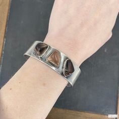 "This beautiful Modernist Scandinavian bracelet was made by Finnish studio Kasityo around 1960 and features three high relief polished quartz cabochons bezel set in 916 silver (Finnish standard). It's a really elegant piece and would look great in a stack! Measures 3/4\" width. Interior measurements 2 3/8 x 2\". Opening 5/8\" wide but this cuff is flexible and will stretch up to 1\". Stamped \"KASITYO\" with full Finnish hallmarks for 916 silver and 1962 date mark. Weighs 36.8 grams. In overall Interior Measurements, Victorian Engagement Rings, Engagement Ring Photos, Antique Brooches, High Relief, Antique Engagement, Deco Engagement Ring, Enamel Ring, Antique Engagement Rings