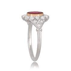 A 1.18ct ruby with a deep red saturation centers the handcrafted platinum ring. The ruby center stone is bezel set in yellow gold and is framed by a floral motif of the diamond halo. The shoulders are also adorned by diamonds. ✦DIAMOND SPECIFICATIONS: Center Stone Size: 1.18-Carats ✦ ENGAGEMENT RING SPECIFICATIONS: Ring Material: Platinum ✦ WHAT COMES IN YOUR SHIPMENT: - Your Engagement Ring - Quality Ring Box - Jewelry Cleaner - UGL Certificate ✦ WHY SHOP WITH US: - We've been in business for 4 Luxury Oval Ruby Ring With Halo Design, Exquisite Oval Ruby Ring Gia Certified, Gia Certified Oval Ruby Ring For Wedding, Oval Ruby Ring With Platinum Center Stone, Oval Ruby Ring With Platinum Band, Oval Ruby Ring With Platinum Setting, Oval Ruby Ring With Platinum, Heirloom Oval Ruby Ring Gia Certified, Gia Certified Heirloom Oval Ruby Ring