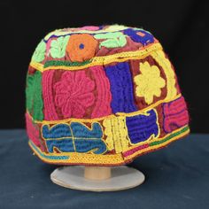 Colourful ,vintage, embroidered Afghan Hat worn by the Pashtun people of Afghanistan. Please see our other listings featuring a great selection from our collection of Afghan Hats (mainly large child/ small adult sizes) Great display and collection pieces Made in Afghanistan circa 1970 Handmade Cap For Festivals, Bohemian Cap Hats For Ceremonial Occasions, Bohemian Cap For Ceremonial Occasions, Traditional Multicolor Hat With Curved Brim, Traditional Hats With Curved Brim For Festivals, Traditional Curved Brim Hat For Festivals, Adjustable Multicolor Hats For Festivals, Multicolor Cap For Festivals, Traditional Curved Brim Festival Hats And Headpieces