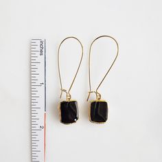 Where the timeless elegance meets modern vibes, that's where you'll find these drop earrings. GEMSTONE: Black Onyx CLOSURE: Gold plated kidney ear wires LENGTH: 2" long Adjustable Elegant Linear Earrings For Everyday, Elegant Everyday Adjustable Linear Earrings, Elegant Wire Wrapped Threader Earrings, Wire Wrapped Long Drop Earrings For Everyday, Everyday Wire Wrapped Long Drop Earrings, Everyday Long Drop Wire Wrapped Earrings, Trendy Metal Linear Earrings With Ear Wire, Adjustable Teardrop Linear Earrings With Ear Wire, Adjustable Nickel-free Drop Earrings