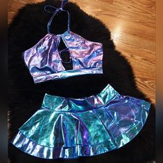 Holographic Strappy Halter Crop Top And Ruffle Mini Skirt Metallic Festival 2 Piece Set Women's Size Medium Perfect For Rave, Festival, Dancewear, Party, Sexy, Cosplay, Pin-Up, Boudior Photos, Dress-Up Nwot! Super Soft And Shiny! 80% Polyester 15% Cotton 5% Spandex Party Purple Ruffled Mini Skirt, Party Mini Skirt With Ruffles In Purple, Fitted Purple Skirt For Club, Purple Party Skort For Spring, Fitted Purple Mini Skirt With Ruffles, Rave Skirt, Ruffle Mini Skirt, Rave Festival, Halter Crop Top