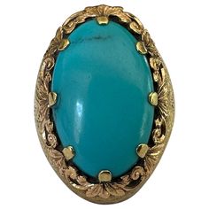 This striking antique cocktail ring features a large natural oval turquoise stone measuring approximately 23.5 X 15.5mm crafted in 18K yellow and rose gold hand-engraved with an intricate floral motif. The captivating color of the turquoise and the fine metalwork make it a true showstopper, embodying the exquisite craftsmanship of the late Art Deco era. Circa 1930-40s. Antique Cocktail Ring, Late Art, Gold Cocktail Ring, Gold Cocktail, Art Deco Era, Gold Hands, Natural Turquoise, Hand Engraving, Cocktail Ring