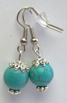 "Summer turquoise earrings I made these hanging earrings to match my turquoise necklaces. This elegants turquoise dangle earrings is a good accessory for work or everyday use. Dress these up or down; a great basic. These earrings will add a pop of color to your ears. A great addition to your spring and summer wardrobe. My jewelry is unique and custom designed and most of my jewelry can easily be resized at no additional charge. I would love to assist you with your custom order, so please do not Turquoise Dangle Jewelry, Turquoise Adjustable Drop Earrings, Hypoallergenic Turquoise Dangle Jewelry, Halloween Earrings Diy, Diy Earrings Tutorial, Blue Stones Jewelry, Turquoise Necklaces, Turquoise Earring, Earrings Tutorial