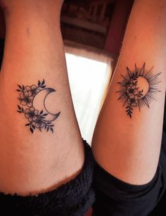 two women with matching tattoos on their legs, both have sun and moon tattoo designs