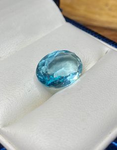 About The Stone: This gemstone is oval shaped 14mm x 10mm x 5mm faceted simulated aquamarine gemstone. -Named after the color of sea water, aquamarine is the blue to blue-green member of the beryl family. The birthstone for March, it represents exhilaration as well as relaxing calm. Once believed to be the treasure of mermaids, it was often worn by sailors and travelers as a talisman to protect against being shipwrecked and to ward off sea sickness. -Simulated gems look like natural gems but che Mystic Fire Topaz, Sea Sickness, Sea Water, Sterling Silver Filigree, Mystic Topaz, Aquamarine Rings, Aquamarine Gemstone, Filigree Ring, Aquamarine Blue