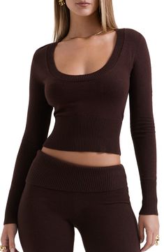 Show some skin in this scoop-neck, midriff-baring sweater knit to fit snugly from a soft yarn blend kissed with cashmere. Scoop neck Long sleeves Ribbed cuffs and hem 49% nylon, 35% acrylic, 10% wool, 6% cashmere Dry clean Imported Lomg Sleeve Brown Shirt, Brown Knit Sweater Cropped, Fitted Cropped Sweater In Soft Knit, Fitted Soft Knit Cropped Sweater, Fitted Crew Neck Sweater For Loungewear, Fine Knit Scoop Neck Top, Fall Seamless Knit Crop Top, Fall Knit Sweater With Scoop Neck, Seamless Knit Top For Fall