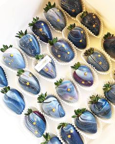 chocolate covered strawberries are arranged in the shape of heart shaped stars and moon shapes