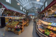 the inside of a grocery store filled with lots of food