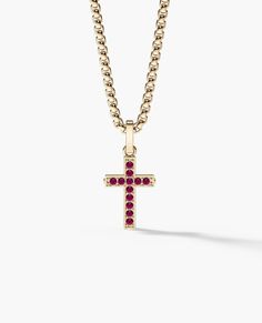 This mini cross pendant can be crafted in your choice of solid gold or platinum, set with 0.25 carats of natural, untreated gemstones - choose from emeralds, rubies, or sapphires. Signature screws on the cross' three sides instantly identify this pendant as a Rockford Collection masterpiece. Pendant is 28 mm tall. Barrel fits chains up to 3.40 mm. Ruby Pendant Necklace, Pinky Signet Ring, Black Diamond Bands, Ruby Necklace Pendant, Comfort Fit Wedding Band, Necklace Cross, Mini Cross, Ruby Pendant, Black Diamond Ring