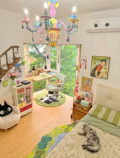 a bedroom with a cat laying on the floor