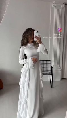 Flowing effortlessly in a white maxi dress, radiating summer vibes ☀️✨ Perfect for beach days or rooftop nights. #WhiteMaxi #SummerStyle #EffortlessChic Modest Dress Birthday, Maxi White Dress Outfit, White Long Dress For Eid, Graduation Outfit Ideas Modest, White Maxi Dress For Beach Eid Festival, Chic White Full-length Dress, All White Outfit Women, White Modest Outfit, White Beach Dress Outfit