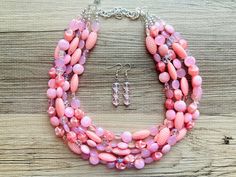 💞One of a kind & ready to ship💞  This colorful five strand chunky necklace makes a great statement piece! Adorned with shades of pale pink and medium pink, this piece can be worn all year long. Punctuated with sweet pink disco balls 💕  16 inch necklace with a 4 inch silver extender chain and lobster clasp.  I make these in tons of colors! Please contact me with any requests.  Thank you for supporting American small business :) Like this style but prefer another color? Check out our other statement necklaces: https://www.etsy.com/shop/PolkaDotDrawer?ref=hdr_shop_menu§ion_id=11059405 Hot Pink Necklace, Bright Jewelry, Pink Disco, Pink Statement Necklace, Jewelry Chunky, 16 Inch Necklace, Chunky Statement Necklace, Disco Balls, Rose Pale