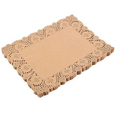 a brown doily on top of a white surface