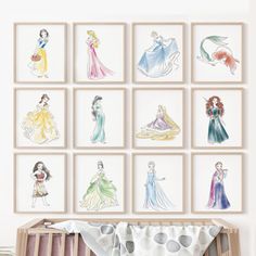 a baby's crib with princess drawings on the wall