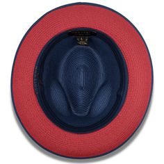 Make a bold statement with this Navy with Red Bottom Braided Pinch Fedora Hat. With its matching grosgrain ribbon, pinch crown, and 2 1/8" wide brim, you can stand out in any crowd! Perfect for taking risks and achieving the daring looks you crave. Available in size XL for an additional $5. Red Bottom Matching Grosgrain Ribbon Pinch Crown Wide Brim: 2 1/8" No Lining Material: Polyester Blend Size XL additional $5 H76-Navy Red Fitted Fedora For Kentucky Derby, Red Fitted Fedora For Beach, Classic Red Hat Bands For Summer, Classic Red Fedora Hat, Red Brimmed Hat Bands For Kentucky Derby, Red Fedora For Kentucky Derby With Curved Brim, Red Curved Brim Fedora For Kentucky Derby, Fitted Red Fedora With Curved Brim, Red Fedora With Curved Brim For Formal Occasions