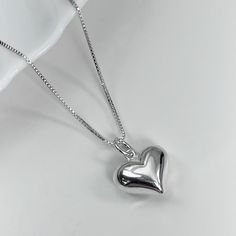 "High Polish Sterling Silver Puffed Heart Pendant on Sterling Silver Box Necklace Chain Please see second photo for size reference Necklace Size:  Please see sizing guide and select preference from drop down list Comes beautifully gift packaged, ready to gift. If you want the item gift packaged with a message card, please type your message in the \"add your personalization\" box or in the \"add a note to elleaccents\" box at the cart page. Shipping Policies: Please see FAQs below" Cute Silver Heart Necklace With Charm, Heart Necklace For Birthday And Valentine's Day, Silver Heart Charm Necklace For Birthday Gift, Cute Heart Necklace For Valentine's Day, Cute Silver Heart Charm Necklace, Cute Valentine's Day Heart Pendant Necklace, Heart Pendant Charm Necklace For Birthday Gift, Cute Silver Charm Necklace For Valentine's Day, Silver Heart Charm Necklace For Birthday