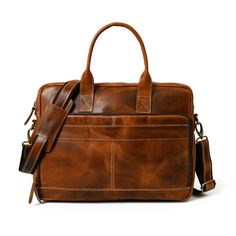 Elevate your professional presence with our Bison Elite Briefcase, meticulously crafted for a stylish edge. Fashioned from the finest full-grain buffalo leather, this masterpiece offers exceptional durability and a unique texture. Designed with capacious compartments and organizational elements, it seamlessly combines practicality with opulence. Its rich brown tone, complemented by striking orange accents, exudes undeniable sophistication, making it a perfect addition to any ensemble. Embrace th Brown Shoulder Bag For Work With Interior Card Slots, Brown Shoulder Bag With Interior Card Slots For Work, Brown Shoulder Bag With Card Slots For Work, Business Cognac Textured Leather Satchel, Professional Leather Satchel For Everyday Use, Cognac Textured Leather Satchel For Business, Cognac Textured Leather Business Satchel, Textured Leather Laptop Bag For Work, Classic Textured Leather Office Briefcase